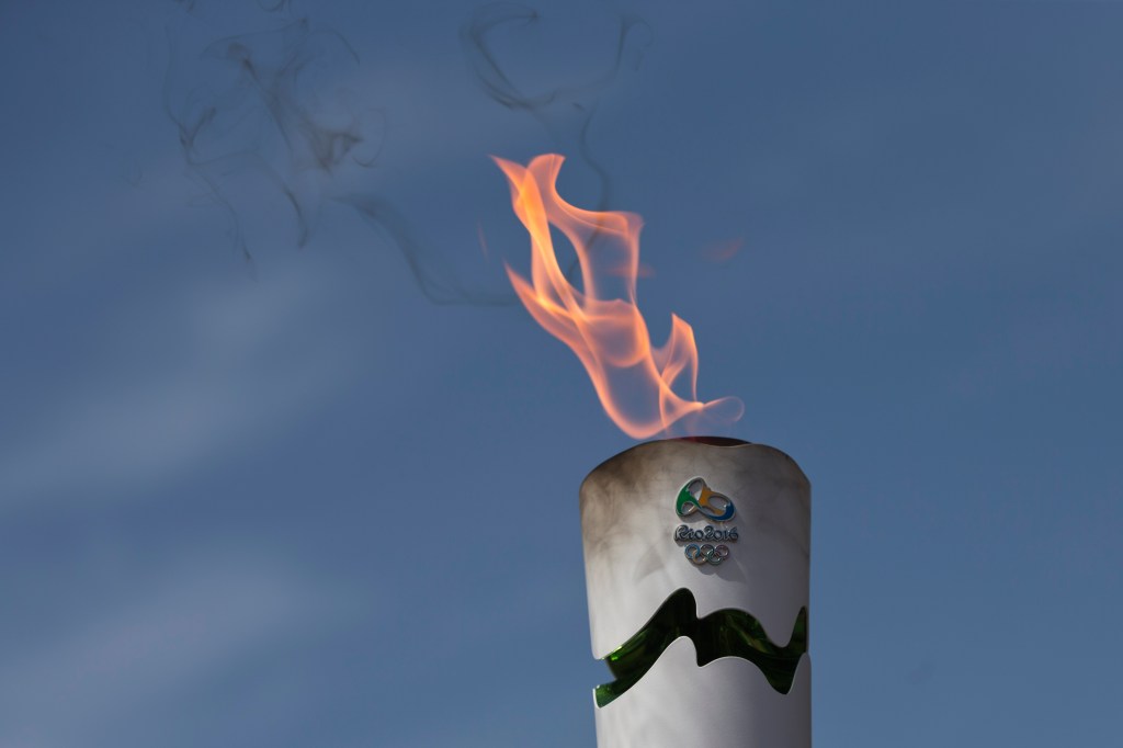 A lit torch of the Rio de Janeiro Olympic games during a dress rehearsal for the lighting of the Rio Olympics flame, in Ancient Olympia, southern Greece, on Wednesday, April 20, 2016. The meticulously choreographed ceremony will be repeated Thursday in the ruined birthplace of the ancient Olympics in southern Greece, in the presence of top International Olympic Committee and Rio organizing officials. That will touch off a relay that will conclude with the Rio Games opening ceremony in August. (AP Photo/Petros Giannakouris)