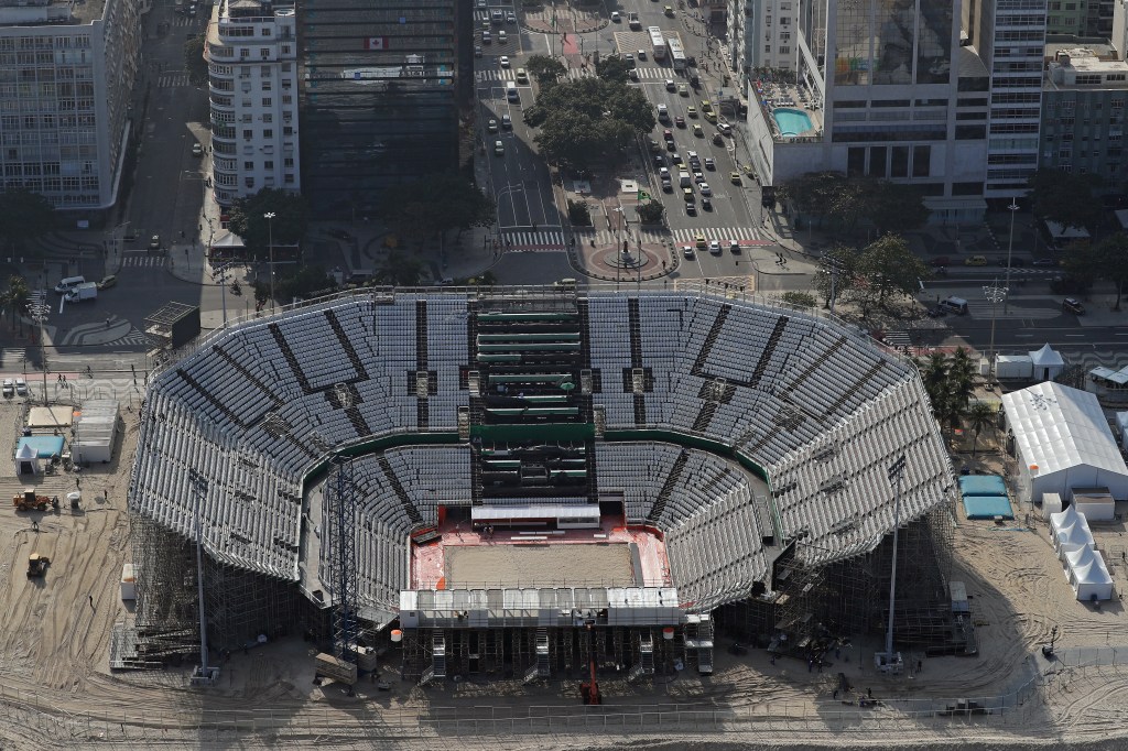 RIO DE JANEIRO, BRAZIL - JULY 25: Work continues on the Olympic Beach Volleyball Arena on Copacabana beach in preparation for the 2016 Summer Olympic Games on July 25, 2016 in Rio de Janeiro, Brazil. (Photo by Michael Heiman/Getty Images)