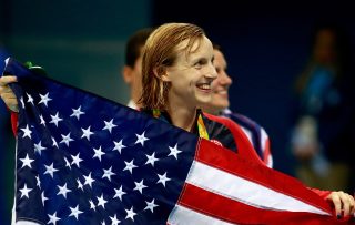 RIO DE JANEIRO, BRAZIL - AUGUST 07: Gold medalist Katie Ledecky of the United States poses during the medal ceremony for the Women's 400m Freestyle Final on Day 2 of the Rio 2016 Olympic Games at the Olympic Aquatics Stadium on August 7, 2016 in Rio de Janeiro, Brazil. (Photo by Adam Pretty/Getty Images)