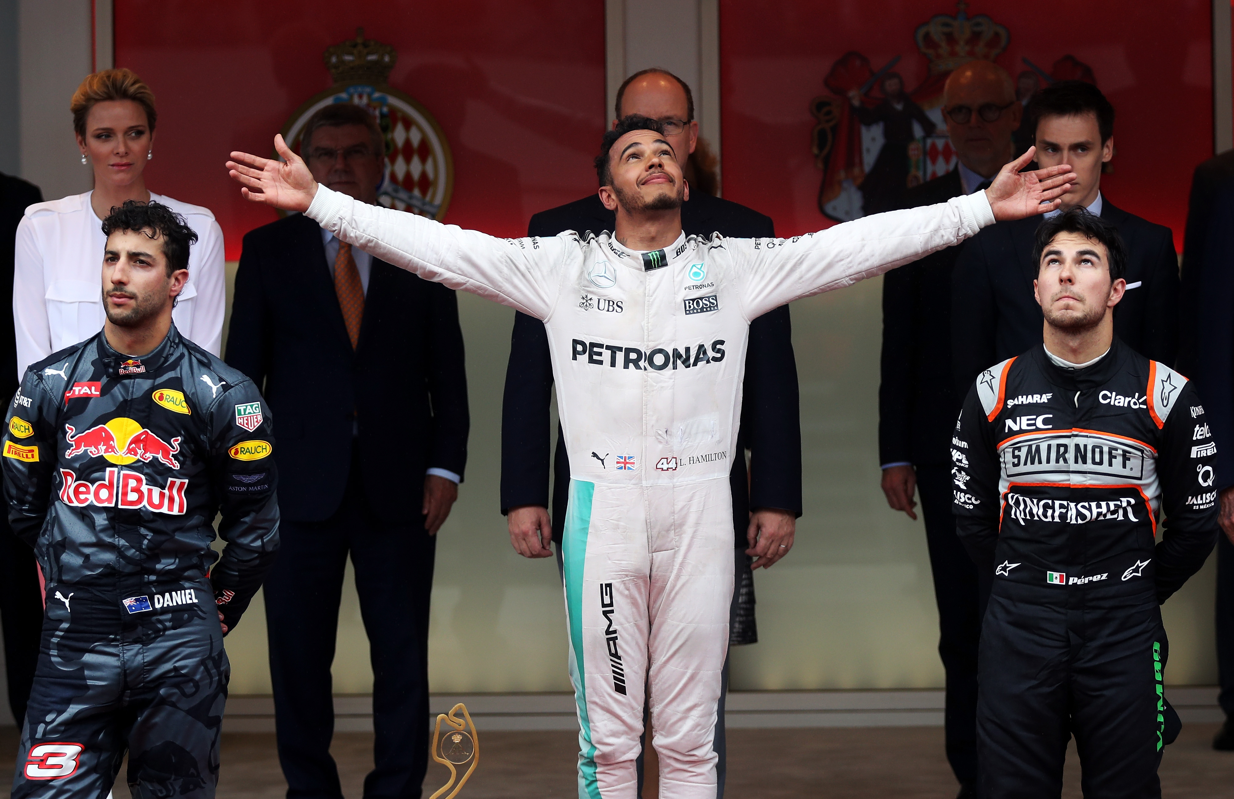 MONTE-CARLO, MONACO - MAY 29: Lewis Hamilton of Great Britain and Mercedes GP celebrates on the podium with Daniel Ricciardo of Australia and Red Bull Racing and Sergio Perez of Mexico and Force India during the Monaco Formula One Grand Prix at Circuit de Monaco on May 29, 2016 in Monte-Carlo, Monaco. (Photo by Lars Baron/Getty Images)