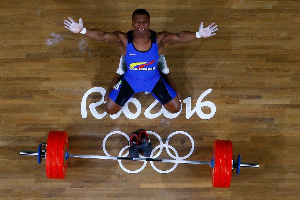 Oscar Albeiro Figueroa Mosquera of Colombia reacts during the Men's 62kg Group A weightlifting contest on Day 3 of the Rio 2016 Olympic Games at the Riocentro - Pavilion 2 on August 8, 2016 in Rio de Janeiro, Brazil.