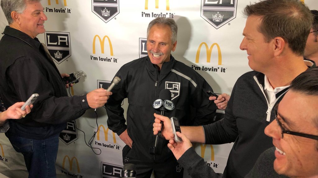 Los Angeles Kings interim coach Willie Desjardins reacts to a question from reporters after his first practice with his new team on Monday, Nov. 5, 2018, in Los Angeles. Desjardins is taking over for the fired John Stevens with hopes of improving the Kings' NHL-worst start to the season. (AP Photo/Greg Beacham)
