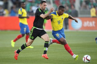 LOS ANGELES, UNITED STATES OF AMERICA - MARCH 28: Miguel Layun of Mexico (L) fights for the ball with Antonio Valencia of Ecuador (R) during a friendly match between Mexico and Ecuador at Memorial Coliseum Stadium on March 28, 2015 in Los Angeles, United States. (Photo by Omar Vega/LatinContent/Getty Images)