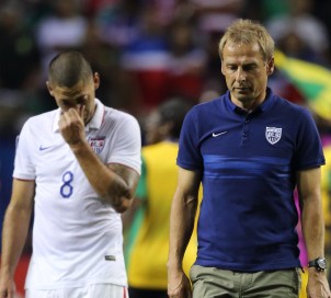 ATLANTA, GA - JULY 22: Clint Dempsey of United States of America and Jurgen Klinsmann the head coach / manager of United States of America walk off the field after the 1-2 defeat in the 2015 CONCACAF Gold Cup Semifinal between USA and Jamaica at Georgia Dome on July 22, 2015 in Atlanta, Georgia. (Photo by Matthew Ashton - AMA/Getty Images)
