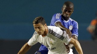 Chelsea midfielder Ramires challenges Real Madrid forward Cristiano Ronaldo (7) during the first half of the International Champions Cup final soccer game, Wednesday, Aug. 7, 2013, in Miami Gardens, Fla. (AP Photo/Wilfredo Lee)