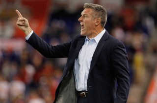 HARRISON, NJ - SEPTEMBER 19: Head Coach Peter Vermes call out from the sidelines during tyhe fgame against the New York Red Bulls at Red Bull Arena on September 19, 2012 in Harrison, New Jersey. Sporting Kansas City defeated New York Red Bulls 2-0. (Photo by Mike Stobe/Getty Images for New York Red Bulls)