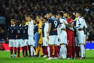 LONDON, ENGLAND - NOVEMBER 17: Both teams stand together for a moment of applause prior to the International Friendly match between England and France at Wembley Stadium on November 17, 2015 in London, England. (Photo by Shaun Botterill/Getty Images)