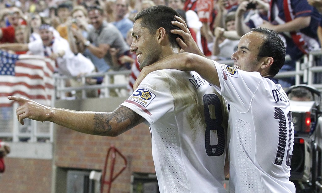 DETROIT, MI - JUNE 7: Clint Dempsey #8 of the United States celebrates a second half goal with Landon Donovan #10 while playing Canada during the 2011 Gold Cup at Ford Field on June 7, 2011 in Detroit, Michigan. The United States won the game 2-0. (Photo by Gregory Shamus/Getty Images)