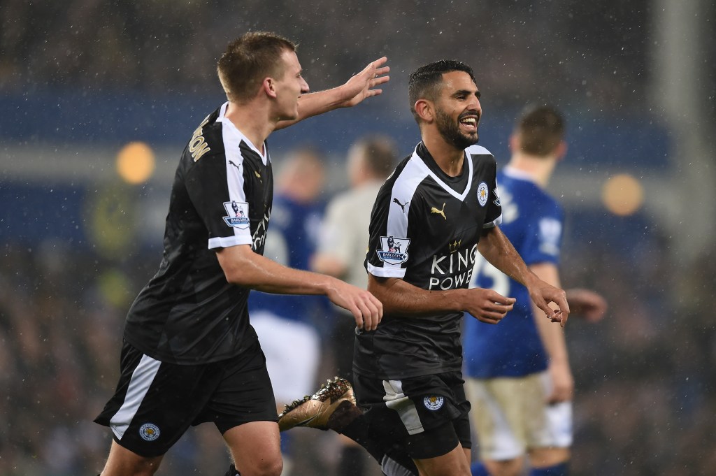 LIVERPOOL, ENGLAND - DECEMBER 19: Riyad Mahrez (R) of Leicester City celebrates scoring his team's second goal with his team mate Marc Albrighton (L) during the Barclays Premier League match between Everton and Leicester City at Goodison Park on December 19, 2015 in Liverpool, England. (Photo by Michael Regan/Getty Images)