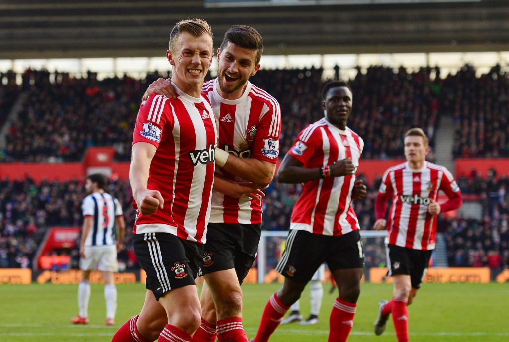 SOUTHAMPTON, ENGLAND - JANUARY 16: James Ward-Prowse (L) of Southampton celebrates scoring his team's second goal with his team mate Shane Long during the Barclays Premier League match between Southampton and West Bromwich Albion at St. Mary's Stadium on January 16, 2016 in Southampton, England. (Photo by Dan Mullan/Getty Images)