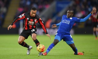 LEICESTER, ENGLAND - JANUARY 02: Junior Stanislas of Bournemouth and Ngolo Kante of Leicester City compete for the bacompete for the ballduring the Barclays Premier League match between Leicester City and Bournemouth at The King Power Stadium on January 2, 2016 in Leicester, England. (Photo by Michael Regan/Getty Images)