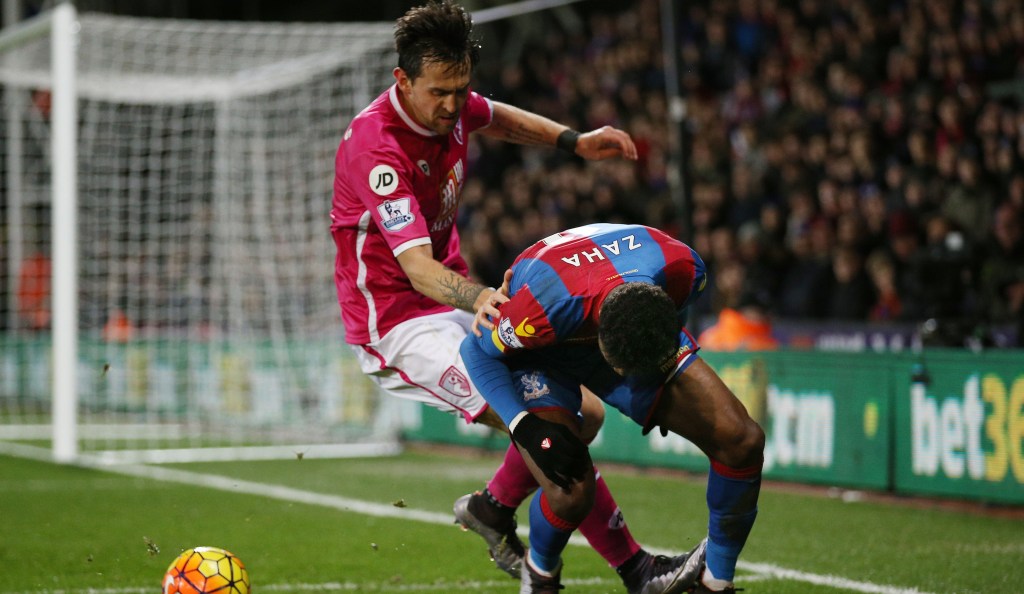 LONDON, ENGLAND - FEBRUARY 02: Wilfried Zaha of Crystal Palace is challenged by Charlie Daniels of Bournemouth during the Barclays Premier League match between Crystal Palace and A.F.C. Bournemouth at Selhurst Park on February 2, 2016 in London, England. (Photo by Ian Walton/Getty Images)