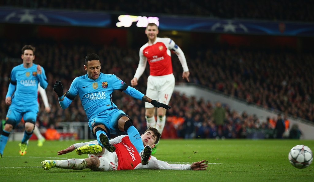 LONDON, ENGLAND - FEBRUARY 23: Hector Bellerin of Arsenal makes a tackle on Neymar of Barcelona during the UEFA Champions League round of 16 first leg match between Arsenal and Barcelona on February 23, 2016 in London, United Kingdom. (Photo by Paul Gilham/Getty Images)