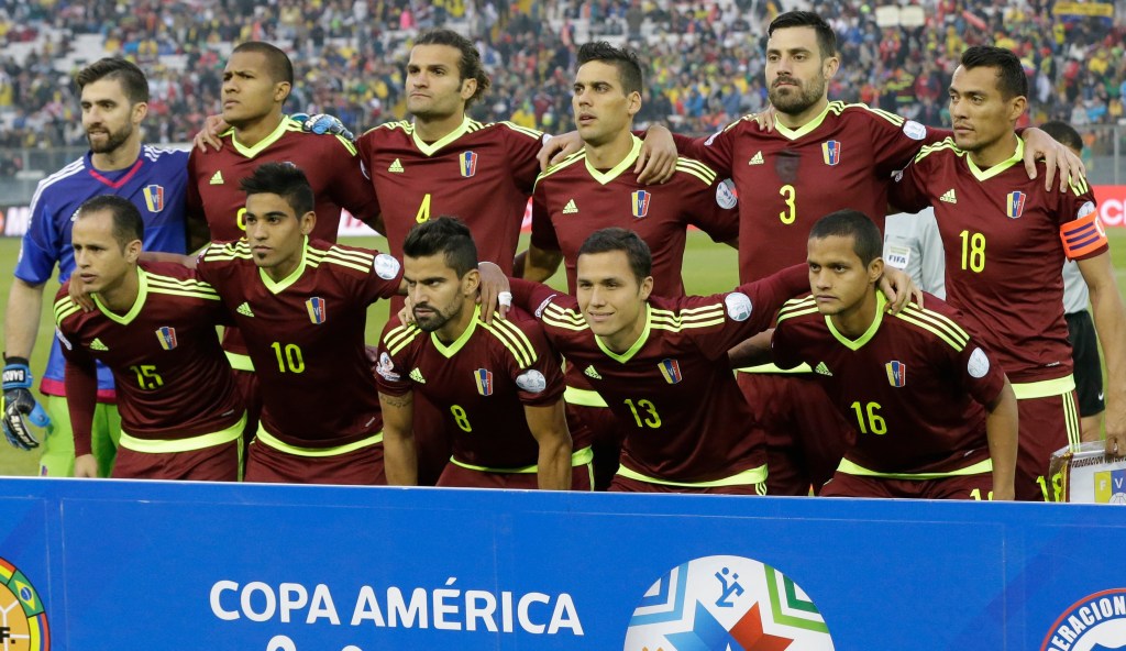 Venezuela's national soccer team pose for a group photo prior a Copa America Group C soccer match against Brazil at the Monumental stadium in Santiago, Chile, Sunday, June 21, 2015. (AP Photo/Jorge Saenz)