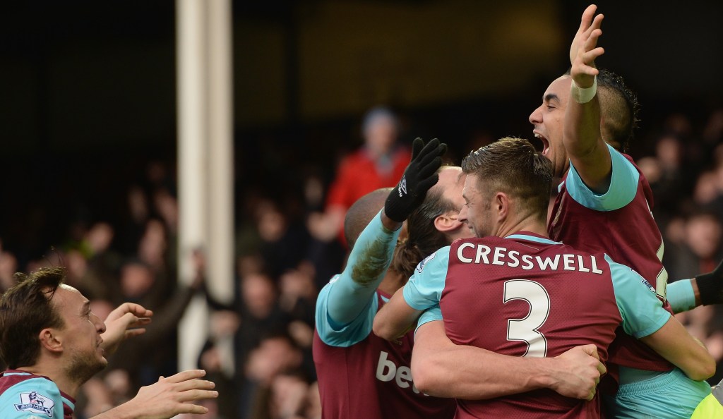 LIVERPOOL, ENGLAND - MARCH 05: Dimitri Payet (1st R) of West Ham United celebrates scoring his team's third goal with his team mates during the Barclays Premier League match between Everton and West Ham United at Goodison Park on March 5, 2016 in Liverpool, England. (Photo by Gareth Copley/Getty Images)