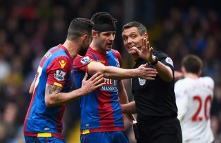 LONDON, ENGLAND - MARCH 06: Damien Delaney and Scott Dann of Crystal Palace appeal to referee Andre Marriner as he awards Liverpool a penalty during the Barclays Premier League match between Crystal Palace and Liverpool at Selhurst Park on March 6, 2016 in London, England. (Photo by Mike Hewitt/Getty Images)