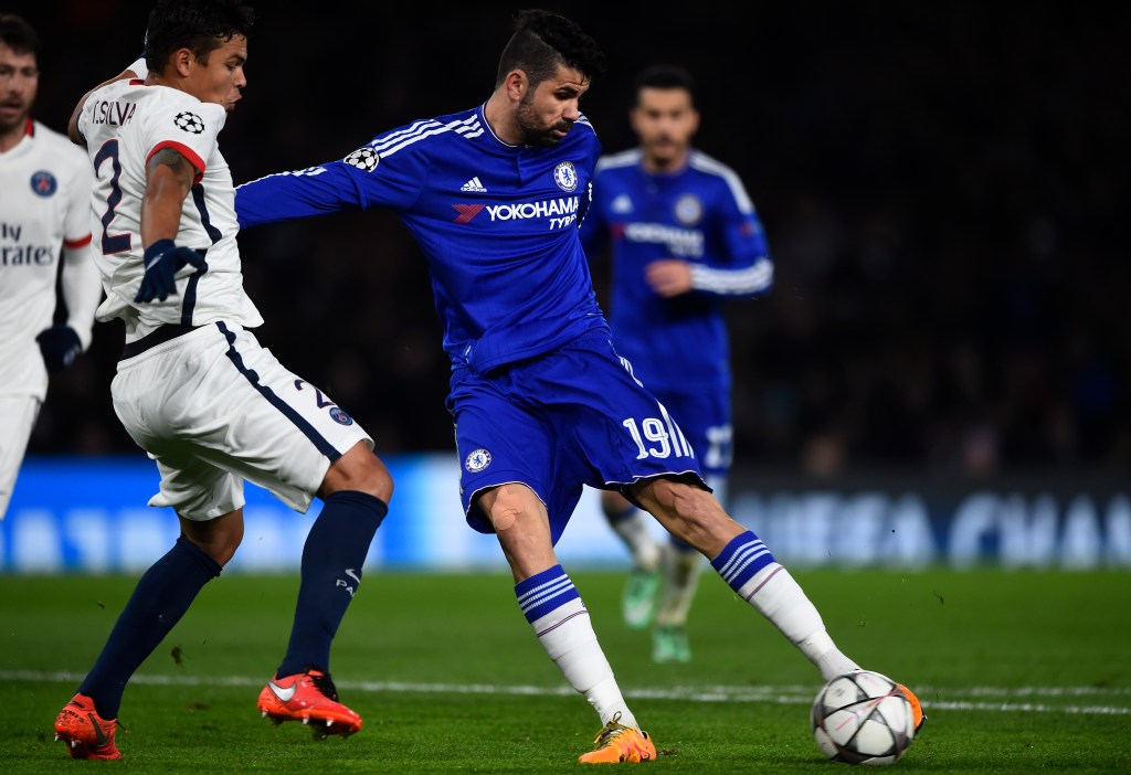 LONDON, ENGLAND - MARCH 09: Diego Costa of Chelsea shoots past Thiago Silva of PSG to score a gol to level the scores at 1-1 during the UEFA Champions League round of 16, second leg match between Chelsea and Paris Saint Germain at Stamford Bridge on March 9, 2016 in London, United Kingdom. (Photo by Mike Hewitt/Getty Images)