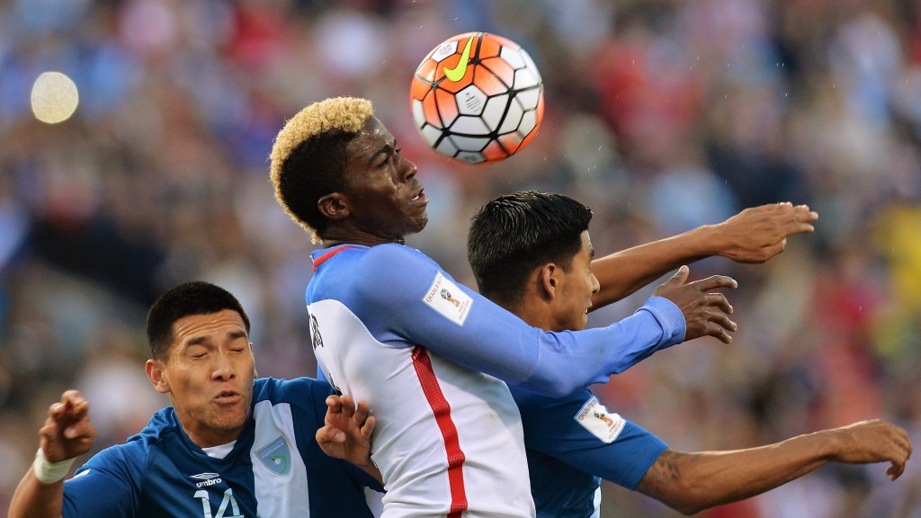 COLUMBUS, OH - MARCH 29: Gyasi Zardes #9 of the United States Men's National Team gets control of the ball around Rafael Morales #14 of Guatemala and Moises Hernandez #5 of Guatemala in the first half to assist on Clint Dempsey #8 of the United States Men's National Team's goal during the FIFA 2018 World Cup qualifier on March 29, 2016 at MAPFRE Stadium in Columbus, Ohio. (Photo by Jamie Sabau/Getty Images)