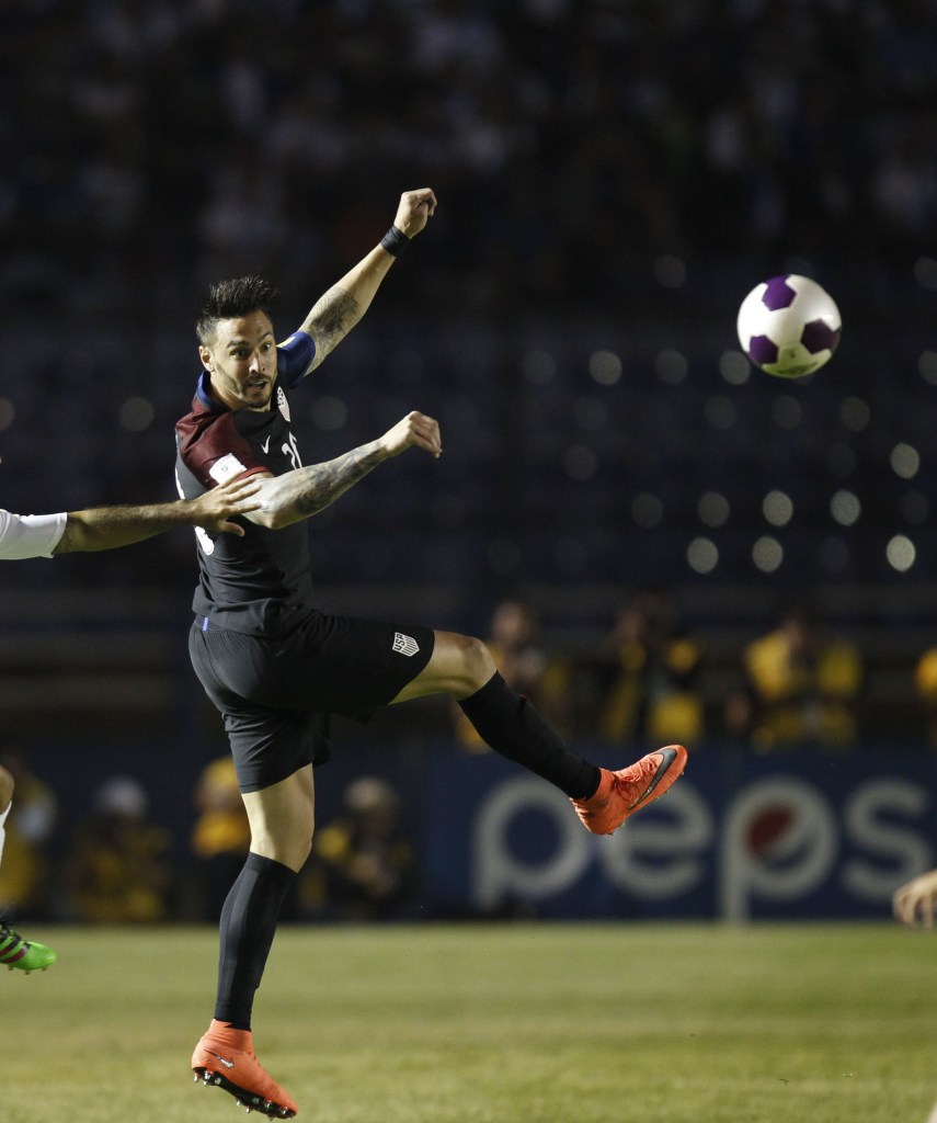 United States' Geoff Cameron, right, and Guatemala's Jose Contreras jump for the ball during a 2018 Russia World Cup qualifying soccer match at Mateo Flores Stadium in Guatemala City, Friday, March 25, 2016. (AP Photo/ Moises Castillo)