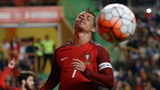 Portugals Cristiano Ronaldo reacts after arriving late at the ball during a friendly soccer match between Portugal and Bulgaria in Leiria, Portugal, Friday, March 25, 2016. (AP Photo/Armando Franca)