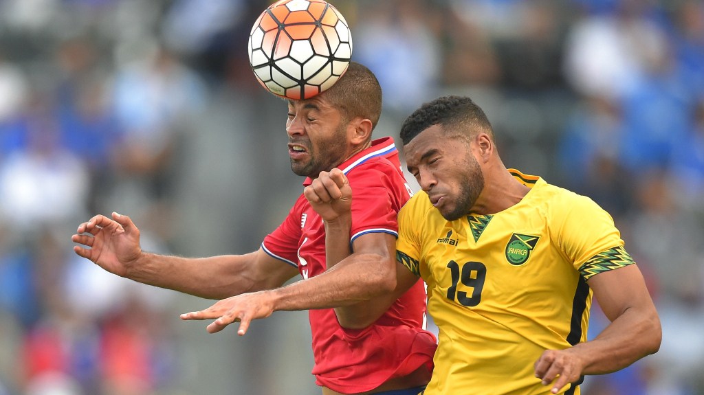 Costa Rica's Alvaro Saborio, left, and Jamaica's Adrian Mariappa try to head the ball during the second half of CONCACAF Gold Cup soccer match, Wednesday, July 8, 2015, in Carson, Calif. The match ended in a 2-2 tie. (AP Photo/Mark J. Terrill)