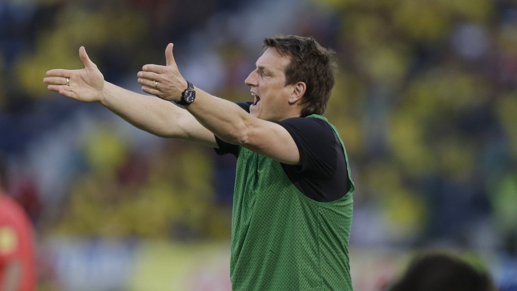 United States' coach Andi Herzog instructs players during a U-23 first leg soccer match qualifier for the 2016 Rio Olympics against Colombia at the Roberto Melendez Stadium in Barranquilla, Colombia, Friday, March 25, 2016. (AP Photo/Fernando Vergara)
