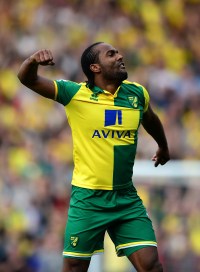 NORWICH, ENGLAND - APRIL 02: Cameron Jerome of Norwich City celebrates at the final whistle during the Barclays Premier League match between Norwich City and Newcastle United at Carrow Road on April 2, 2016 in Norwich, England. (Photo by Dan Mullan/Getty Images)