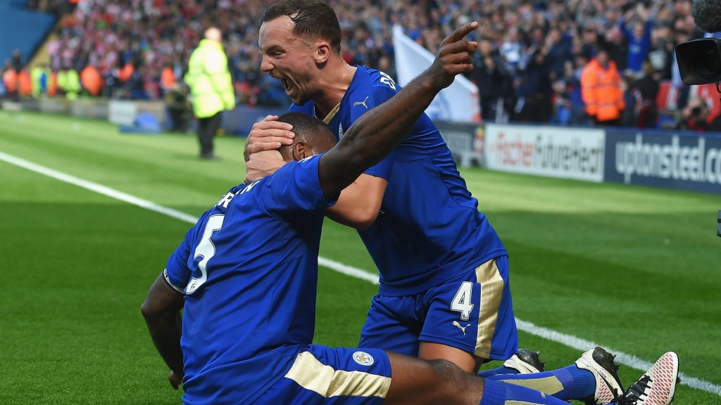 LEICESTER, ENGLAND - APRIL 03: Wes Morgan of Leicester City (5) celebrates with team mate Danny Drinkwater as he scores their first goal during the Barclays Premier League match between Leicester City and Southampton at The King Power Stadium on April 3, 2016 in Leicester, England. (Photo by Michael Regan/Getty Images)