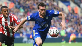 LEICESTER, ENGLAND - APRIL 03: Christian Fuchs of Leicester City is chased by Ryan Bertrand of Southampton during the Barclays Premier League match between Leicester City and Southampton at The King Power Stadium on April 3, 2016 in Leicester, England. (Photo by Michael Regan/Getty Images)