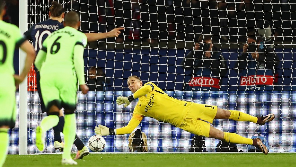PARIS, FRANCE - APRIL 06: Joe Hart of Manchester City saves the penalty by Zlatan Ibrahimovic of Paris Saint-Germain during the UEFA Champions League Quarter Final First Leg match between Paris Saint-Germain and Manchester City at Parc des Princes on April 6, 2016 in Paris, France. (Photo by Clive Rose/Getty Images)