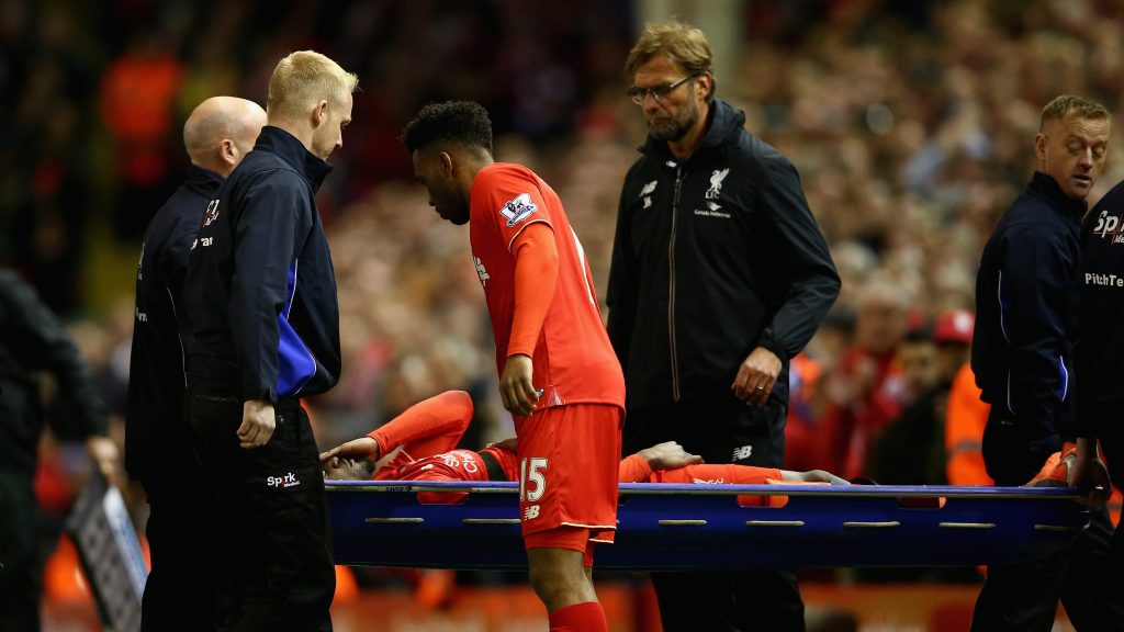 LIVERPOOL, ENGLAND - APRIL 20: Divock Origi of Liverpool leaves the field on a stretcher being replaced by Daniel Sturridge of Liverpool during the Barclays Premier League match between Liverpool and Everton at Anfield, April 20, 2016, Liverpool, England (Photo by Clive Brunskill/Getty Images)