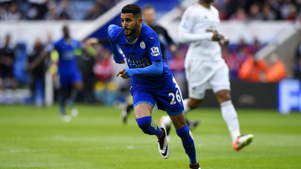 LEICESTER, ENGLAND - APRIL 24: Riyad Mahrez of Leicester City celebrates as he scores their first goal during the Barclays Premier League match between Leicester City and Swansea City at The King Power Stadium on April 24, 2016 in Leicester, United Kingdom. (Photo by Mike Hewitt/Getty Images)