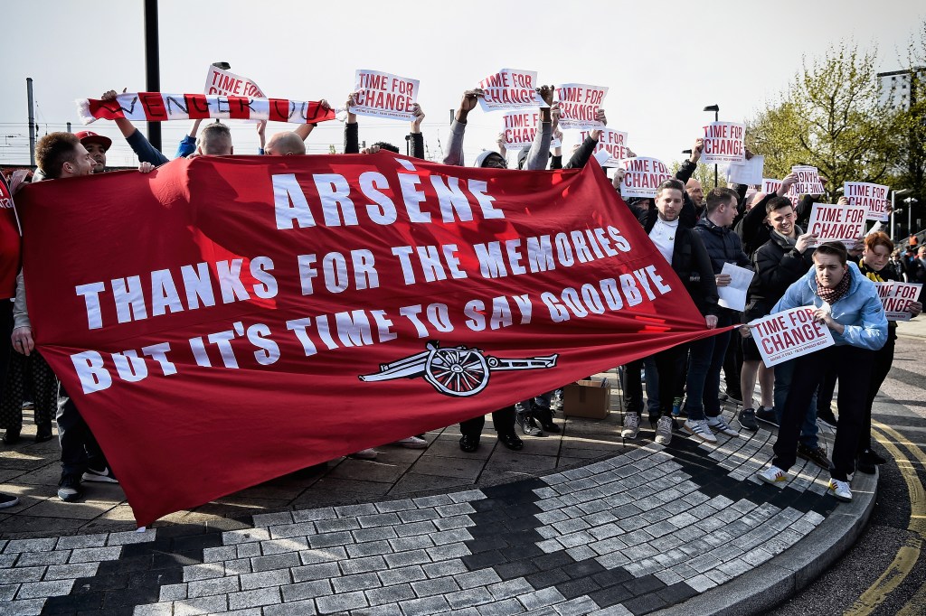 LONDON, ENGLAND - APRIL 30: (EDITORS NOTE: This image was processed using digital filters) Arsenal supporters hold a banner saying 'Arsene Thanks for the Memories But It's Time To Say Goodbye' prior the Barclays Premier League match between Arsenal and Norwich City at The Emirates Stadium on April 30, 2016 in London, England (Photo by Mike Hewitt/Getty Images)