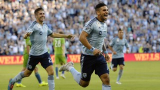 Sporting Kansas City's Connor Hallisey, left, and Dom Dwyer react after Dwyer's second-half goal against the Seattle Sounders during the second half of an MLS soccer match Sunday, Sept. 27, 2015, in Kansas City, Kan. (Jill Toyoshiba/The Kansas City Star via AP)