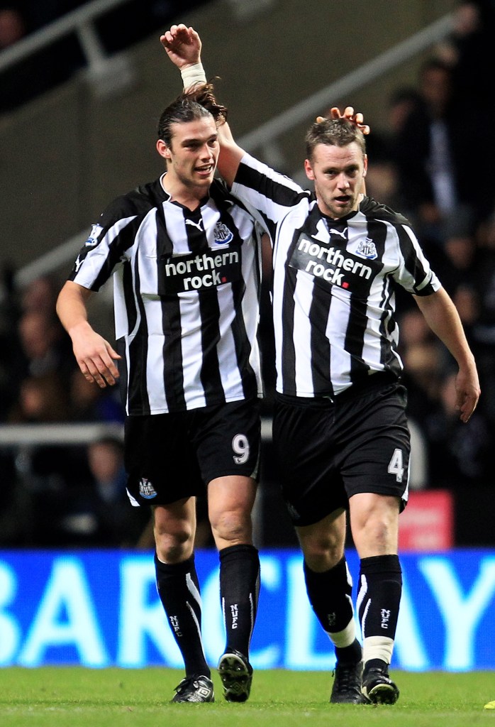 NEWCASTLE UPON TYNE, ENGLAND - DECEMBER 11: Kevin Nolan of Newcastle United celebrates scoring the opening goal with team mate Andy Carroll (L) during the Barclays Premier League match between Newcastle United and Liverpool at St James' Park on December 11, 2010 in Newcastle, England. (Photo by Mark Thompson/Getty Images)