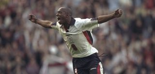 24 May 1997: Ian Wright of England celebrates after scoring a goal during the International Friendly against South Africa at Old Trafford in Manchester, England. England won the match 2-1. Mandatory Credit: Ben Radford /Allsport