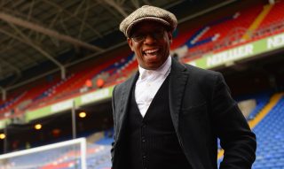 LONDON, ENGLAND - MARCH 14: Commentator Ian Wright smiles prior to the Barclays Premier League match between Crystal Palace and Queens Park Rangers at Selhurst Park on March 14, 2015 in London, England. (Photo by Christopher Lee/Getty Images)