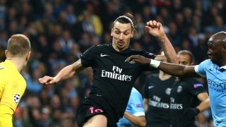 MANCHESTER, ENGLAND - APRIL 12: Zlatan Ibrahimovic of Paris Saint-Germain beats Eliaquim Mangala (20) and Joe Hart of Manchester City to score, but his goal is disallowed during the UEFA Champions League quarter final second leg match between Manchester City FC and Paris Saint-Germain at the Etihad Stadium on April 12, 2016 in Manchester, United Kingdom. (Photo by Clive Brunskill/Getty Images)