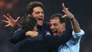LONDON, ENGLAND - MAY 10: Slaven Bilic manager of West Ham United (R) celebrates victory with staff after the Barclays Premier League match between West Ham United and Manchester United at the Boleyn Ground on May 10, 2016 in London, England. West Ham United are playing their last ever home match at the Boleyn Ground after their 112 year stay at the stadium. The Hammers will move to the Olympic Stadium for the 2016-17 season. (Photo by Julian Finney/Getty Images)