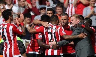 SOUTHAMPTON, ENGLAND - MAY 15: Southampton players and Ronald Koeman manager of Southampton celebrate their team's second goal during the Barclays Premier League match between Southampton and Crystal Palace at St Mary's Stadium on May 15, 2016 in Southampton, England. (Photo by Steve Bardens/Getty Images)