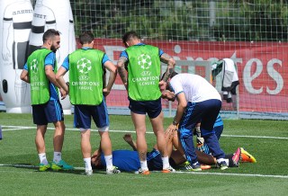 MADRID, SPAIN - MAY 24: Cristiano Ronaldo of Real Madrid reacts after getting injured in the team training session during the Real Madrid Open Media Day ahead of the UEFA Champions League Final against Club Atletico Madrid at Valdebebas training ground on May 24, 2016 in Madrid, Spain. (Photo by Denis Doyle/Getty Images)