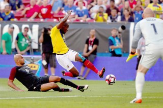 FRISCO, TX - MAY 25: Christian Noboa #6 of Ecuador takes a shot against John Brooks #6 of the United States and Brad Guzman #1 of the United States in the first half during an International Friendly match at Toyota Stadium on May 25, 2016 in Frisco, Texas. (Photo by Tom Pennington/Getty Images)