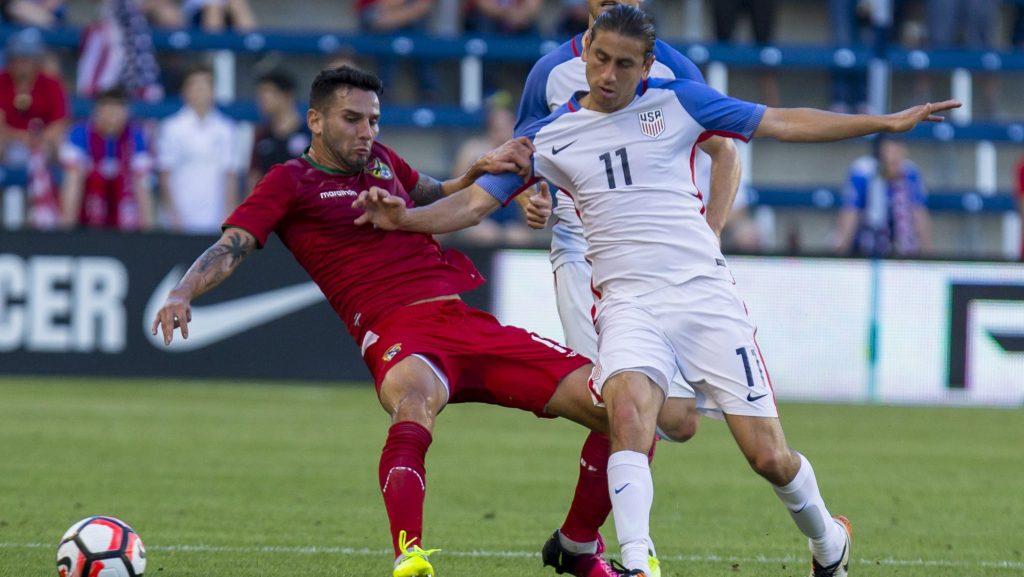 KANSAS CITY, KS - MAY 28: Alejandro Bedoya #11 of USA knocks down Alejandro Meleán #13 of Bolivia in the first half of the COPA America Centenario USA 2016 on May 28, 2016 at Children's Mercy Park in Kansas City, Kansas. (Photo by Kyle Rivas/Getty Images)