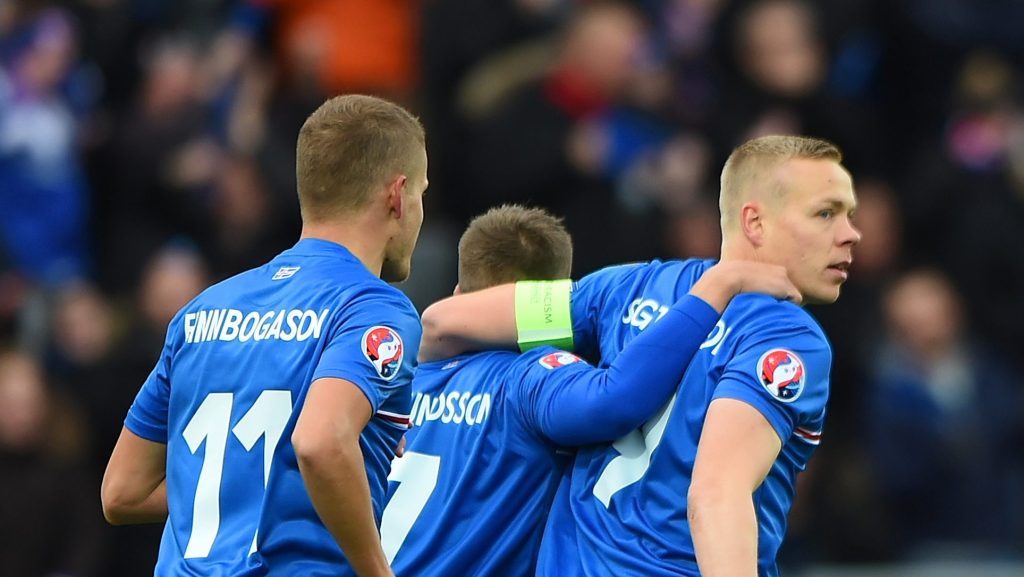 REYKJAVIK, ICELAND - OCTOBER 10: Kolbeinn Sightorsson (1st R) of Iceland celebrates scoring the opening goal during the UEFA EURO 2016 Qualifier match between Iceland and Latvia at Laugardalsvollur National Stadium on October 10, 2015 in Reykjavik, Iceland. (Photo by Tom Dulat/Getty Images).