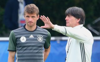EVIAN-LES-BAINS, FRANCE - JUNE 09: Joachim Loew, head coach of the German national team talks to his player Thomas Mueller during a Germany training session ahead of the UEFA EURO 2016 at Ermitage Evian on June 9, 2016 in Evian-les-Bains, France. Germany's opening match at the European Championship is against Ukraine on June 12. (Photo by Alexander Hassenstein/Getty Images)
