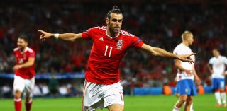 TOULOUSE, FRANCE - JUNE 20: Gareth Bale of Wales celebrates scoring his team's third goal during the UEFA EURO 2016 Group B match between Russia and Wales at Stadium Municipal on June 20, 2016 in Toulouse, France. (Photo by Dean Mouhtaropoulos/Getty Images)