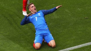 LYON, FRANCE - JUNE 26: Antoine Griezmann of France celebrates scoring his team's first goal during the UEFA EURO 2016 round of 16 match between France and Republic of Ireland at Stade des Lumieres on June 26, 2016 in Lyon, France. (Photo by Lars Baron/Getty Images)
