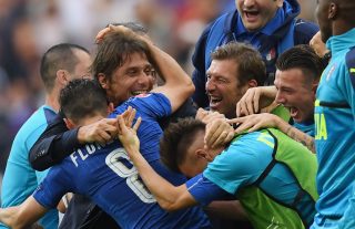PARIS, FRANCE - JUNE 27: Antonio Conte head coach of Italy celebrates his team's 2-0 win with his team players and staffs after the UEFA EURO 2016 round of 16 match between Italy and Spain at Stade de France on June 27, 2016 in Paris, France. (Photo by Matthias Hangst/Getty Images)