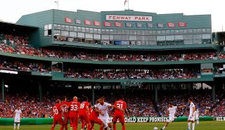 BOSTON, MA - JULY 25: Francesco Totti #10 of AS Roma takes a free kick against Liverpool during a pre-season tour friendly match on July 25, 2012 at Fenway Park in Boston, Massachusetts. (Photo by Jared Wickerham/Getty Images)