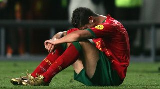LISBON, PORTUGAL - JULY 4: Cristiano Ronaldo of Portugal in tears after the UEFA Euro 2004, Final match between Portugal and Greece at the Luz Stadium on July 4, 2004 in Lisbon, Portugal. (Photo by Ben Radford/Getty Images) *** Local Caption *** Cristiano Ronaldo